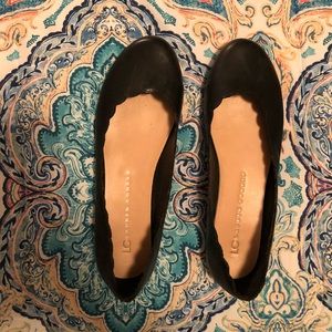 Black scalloped flats